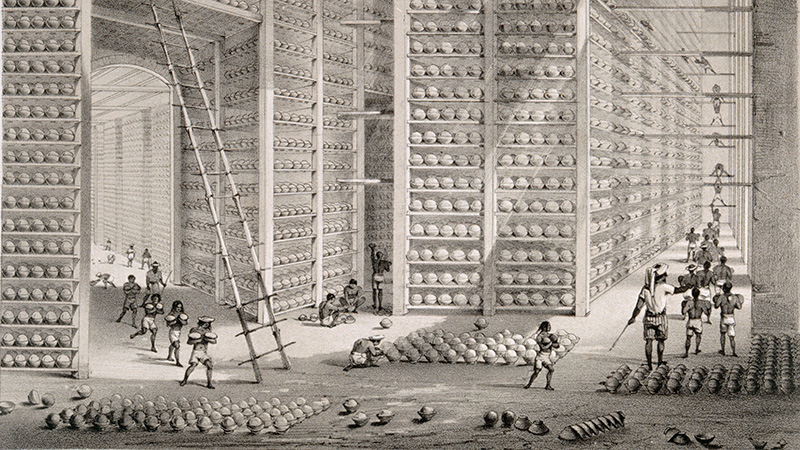 A busy stacking room in the opium factory at Patna, India.